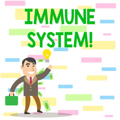 Writing note showing Immune System. Business concept for host defense system comprising analysisy biological structures Successful Businessman Generating Idea or Finding Solution