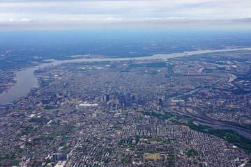 Fototapeta na wymiar Aerial view of the skyline of the city of Philadelphia and the surrounding areas in Pennsylvania, United States