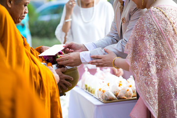 The offering of food to Buddhist monks