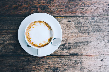 cup of coffee tablet and smart phone on wooden table