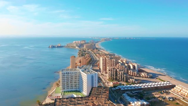 Aerial view. Panoramic view of streets, roads and buildings foreland La Manga del Mar Menor, Cartagena, Murcia, Spain.