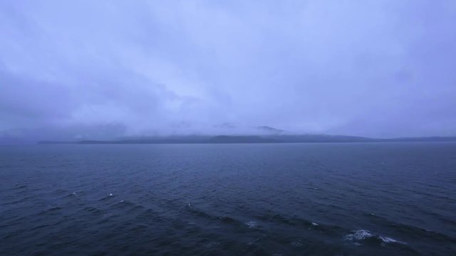 Sailing on the sea, traveling to Juru, Alaska, USA, quiet and cold morning