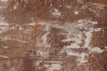 old, rusty metal surface with dirty white traces