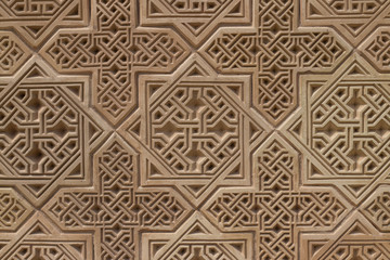 mosaic of clay tiles on a medieval mausoleum in the city of Taraz. Geometric pattern. Eight-pointed star, Muslim symbols in architecture.