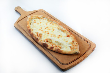 grilled baked cheese pizza called pide turkish cuisine white background