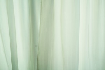 Obraz premium green curtain or drapery background