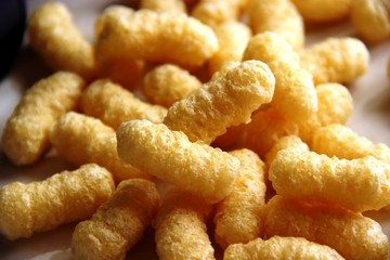 big snack, corn sticks without sugar and gluten on a gray table