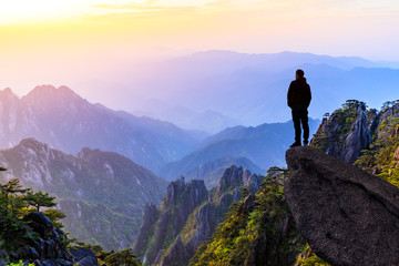 Man on top of mountain,conceptual scene