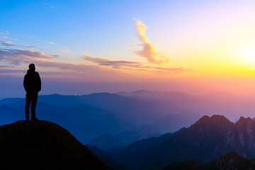 Obraz premium Man on top of mountain,conceptual scene
