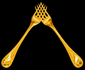 Fourchettes d’or entrecroisées 