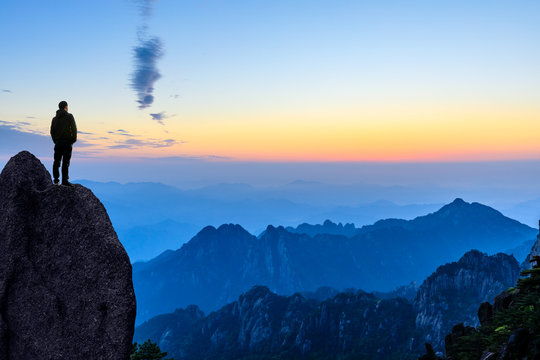 Man on top of mountain,conceptual scene