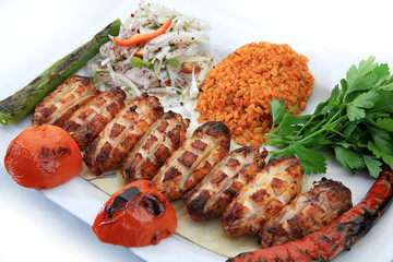 grilled chicken wings with cracked wheat and tomato