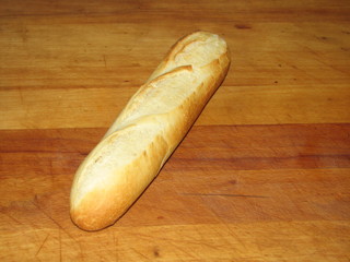 loaf, baguette on a wooden Board
