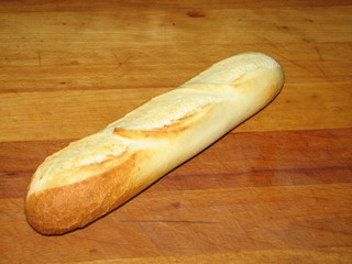 loaf, baguette on a wooden Board