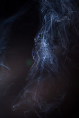 Smoke on a black background.