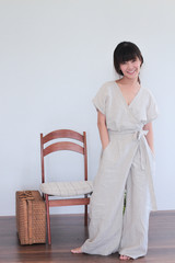 Fashion Portrait of Young  asian woman wearing natural fabric linen minimal clothing - copy space white background
