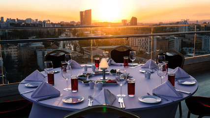 fancy sunset table on roof tea time