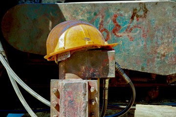 Orange safety helmet put on abortion. 