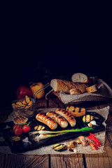 Delicious  grilled sausage with various grilled vegetables