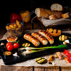 Delicious  grilled sausage with various grilled vegetables