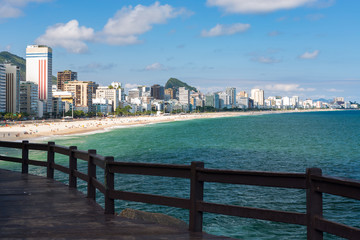 Lookout point to the Ipanema beach at Mirante do Leblon, sandy beach in a hot beautiful sunny summer day, cloudy blue sky, Rio de Janeiro, Brazil. 