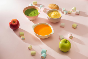 Homemade vegetable baby food purees in glass jars