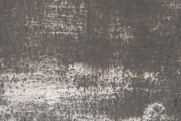 Abstract old scratched smoked metal texture with shaded edges, grunge background.