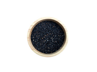 Raw black sesame seed in wooden cup isolated on white background. 