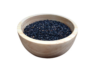 Raw black sesame seed in wooden cup isolated on white background. 