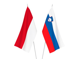 National fabric flags of Slovenia and Indonesia isolated on white background. 3d rendering illustration.