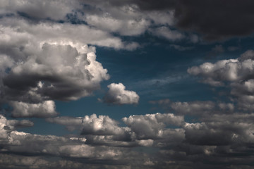 fluffy white cloud on air clear blue sky weather background. high contrast