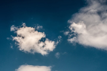 white cloud on air clear blue sky weather background. high contrast