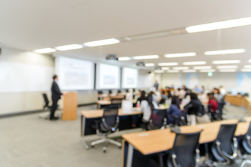 Abstract blurred image of conference and presentation in the meeting room
