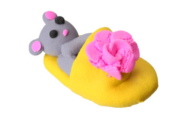 plasticine mouse in sneakers isolated on white background. modelling clay