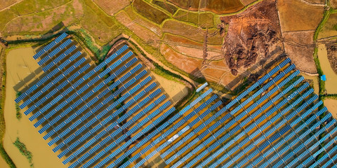 Aerial photography of solar photovoltaic panels built on the surface of the water