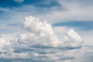 Fototapeta na wymiar fluffy white cloud on air clear blue sky weather background. high contrast