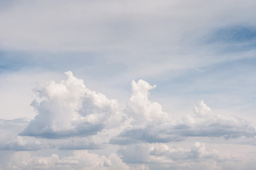 Fototapeta premium fluffy white cloud on air clear blue sky weather background. high contrast