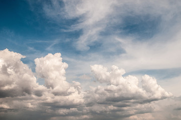 fluffy white cloud on air clear blue sky weather background. high contrast