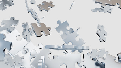 Several Grey Puzzle pieces scattered