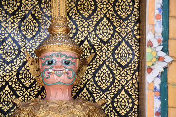 Famous giants infront of Wat Pho gate, his name is Satthasoone with pink body, Bangkok, Thailand