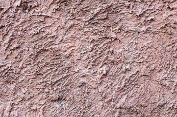 Concrete of pink plastered wall pattern background. Scarlet red wall texture grunge backdrop. Beautiful decorative pink plastered wall, rosy color painted stucco. 