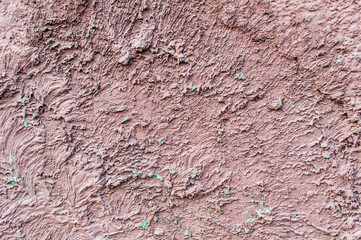 Concrete of pink plastered wall pattern background. Scarlet red wall texture grunge backdrop. Beautiful decorative pink plastered wall, rosy color painted stucco. 