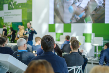 Audience listens to the lecturer at the conference