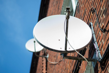 satellite tv antenna on a residential building