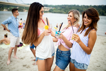 Happy people having fun in summer holidays. Friends, vacation, summer lifestyle and youth concept