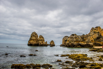 Fototapeta na wymiar Cliffs of Dona Ana Beach in Lagos, Algarve - Portugal