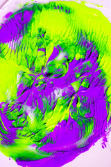 Dynamic fluid color paint splashes background. Blue and orange mixed liquid backdrop. Abstract marbling effect. Dynamic fluid