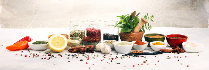 Spices and herbs on table. Food and cuisine ingredients with basil