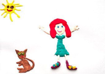 girl, cat, sun from plasticine on a white background