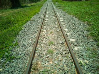 Obraz premium Railroad and green grass.